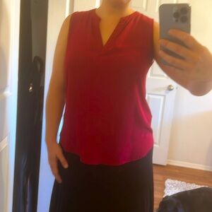 Red sleeveless blouse